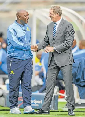  ?? Picture: SYDNEY SESHIBEDI/GALLO IMAGES ?? GIVE HIM TIME: Former Bafana player Steven Pienaar has backed Bafana Bafana coach Stuart Baxter, seen here with Mamelodi Sundowns coach Pitso Mosimane