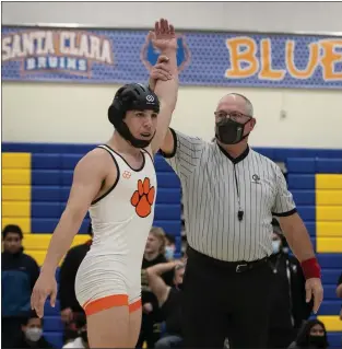  ?? PHOTO BY JIM GENSHEIMER ?? Los Gatos' Anthony Pavlov-ramirez is declared the winner over Fremont's Darragh Howard in the 145weight class at the Santa Clara Valley Athletic League finals at Santa Clara High School on Feb. 12 in Santa Clara.