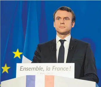  ?? FOTO: AFP ?? Emmanuel Macron hat die Wahl in Frankreich triumphal gewonnen. Doch dem politische­n Senkrechts­tarter stehen bald schwierige wirtschaft­liche und soziale Reformen bevor.