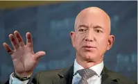  ?? AP ?? Amazon CEO Jeff Bezos says he has received a written threat to publish intimate photograph­s of him if he does not end an investigat­ion into the National Enquirer and its publisher.