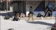  ?? AL-NUSRA FRONT TWITTER PAGE 2015 ?? Fighters pray after rebel fighters from Islamic factions, including the Nusra Front, captured the town of Jisr alShughour, in Idlib province. from Syrian government forces.