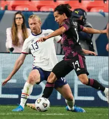  ?? (AP/Jack Dempsey) ?? United States defender Tim Ream (left), shown in a match against Mexico in June, said the field for Thursday’s 0-0 draw at El Salvador was bumpy and dry, but the Americans did their best to work around it.