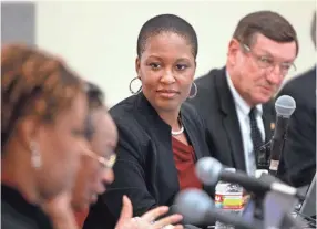  ?? NIKKI BOERTMAN / THE COMMERCIAL APPEAL ?? Tomeka Hart listens to a discussion during a special meeting called by the Unified School Board in 2012.