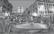  ?? DOMINIC ARIZONA BONUCCELLI/RICK STEVES’ EUROPE ?? Sitting on the Spanish Steps — a Roman pastime as seen in this photo from 2011 — could now land you a hefty fine.