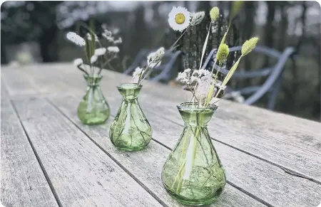  ?? ?? Above: Three Apple Green Bud Vases, Gone to Seed.