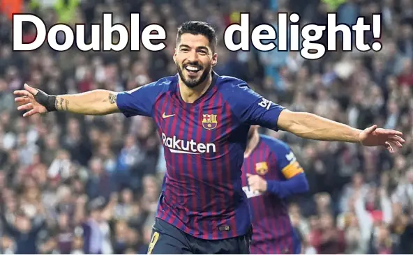  ??  ?? What a feeling: Barcelona forward Luis Suarez celebratin­g after scoring one of his two goals against Real Madrid during the Spanish King’s Cup semi-final second leg at the Bernabeu on Wednesday. — AP