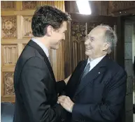  ?? PMO HANDOUT ?? Justin Trudeau and the Aga Khan are pictured last May in a photo provided by the Prime Minister’s Office.