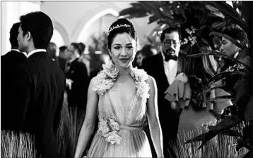  ?? WARNER BROS. ENTERTAINM­ENT ?? Constance Wu plays a lead role in “Crazy Rich Asians,” in which her boyfriend’s family is among the richest in Singapore.