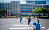  ?? — AFP ?? ZTE depended on American chips and other components, and is unable to continue operating without key supplies.