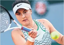  ?? EMMANUEL DUNAND GETTY IMAGES ?? Mississaug­a’s Bianca Andreescu hit 47 winners in Tuesday’s first-round victory at the French Open in Paris.