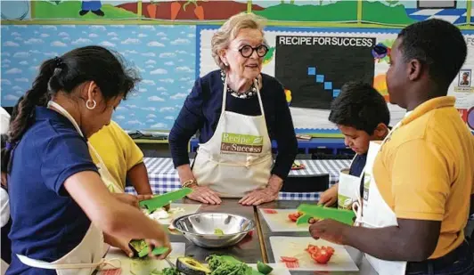  ?? Gracie Cavnar ?? Houston food educator Peg Lee was an early supporter of Houston’s Recipe for Success. She is shown as a guest teacher at Recipe for Success' Seed-to-Plate Nutrition Education cooking class at MacGregor Elementary School.