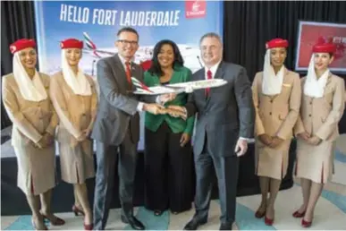  ??  ?? A ceremonial gift exchange between Broward County Mayor, Barbara Sharief, Divisional Senior Vice President of Commercial Operations, Western Hemisphere of Emirates, Hubert Frach and Fort Lauderdale-Hollywood Internatio­nal Airport CEO, Aviation...