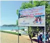  ??  ?? An awareness board displayed at the Trincomale­e coastal belt to promote a cleaner greener beach