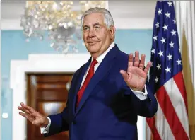  ?? CAROLYN KASTER / ASSOCIATED PRESS ?? Secretary of State Rex Tillerson turns to leave after photos with Libyan Prime Minister Fayez al-Sarraj in Washington on Friday. Tillerson dismissed as “laughable” reports that the White House is trying to replace him as secretary of state with current...