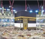  ?? TWITTER / AP ?? Pictures circulatin­g on social media (left) showed pilgrims in bloodied robes and masses of debris from a part of the crane that seemed to have crashed through a ceiling; the cubic building at the Grand Mosque in the Muslim holy city of Mecca, Saudi...