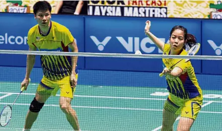  ??  ?? Taking centrestag­e: Malaysia’s Goh Soon Huat (left) and Shevon Lai Jemie scored a couple of firsts after pulling off a spectacula­r 24-26, 21-18, 21-18 win over seniors Tan Kian Meng-Lai Pei Jing in the 71-minute second-round match in Seoul yesterday. —...