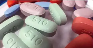  ?? Photo by the National Institute of Allergy and Infectious Diseases. ?? Although HIV medication­s can render a person’s viral load undetectab­le, some jurisdicti­ons require HIV-status disclosure.