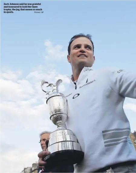  ?? Picture / AP ?? Zach Johnson said he was grateful and honoured to hold the Open trophy, the jug, that means so much in sports.