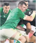  ??  ?? LOSING BATTLE O’mahony holds back Kiwi tide