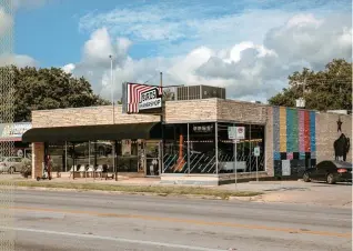  ??  ?? PARTY IN THE FRONT, BUSINESS IN THE BACK Even after being sold to corporate giant General Mills, Epic Provisions still operates out of the back of this one-story barbershop in Austin, where dogs roam the office and flip-flops are standard attire.