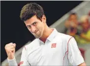  ?? AFP PHOTO ?? Novak Djokovic reacts after winning a point against Lukas Rosol in in Beijing. Djokovic won 6-0, 6-3.