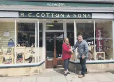  ??  ?? Anne Cotton and James North outside R C Cotton and Sons, in Oundle.