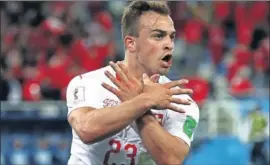  ??  ?? SHAQIRI. Celebró su gol escenifica­ndo el águila bicéfala albanesa.