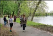  ?? DIGITAL FIRST MEDIA FILE PHOTO ?? People walk along the Schuylkill River Trail in Pottstown during the Mercury Mile. The afternoon stroll is a weekly event and the location changes each time.