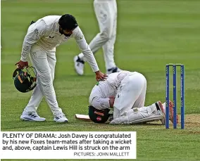  ?? PICTURES: JOHN MALLETT ?? PLENTY OF DRAMA: Josh Davey is congratula­ted by his new Foxes team-mates after taking a wicket and, above, captain Lewis Hill is struck on the arm