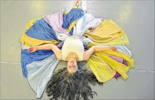  ?? SUBMITTED PHOTO ?? Performanc­e artist Corie Harnett rehearses for “Ori,” her collaborat­ive show with textile artist Bruno Vinhas, running this week at the Barbara Barrett Theatre in St. John’s.