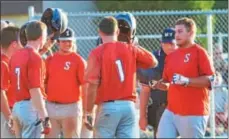  ?? JOHN BREWER - ONEIDA DAILY DISPATCH ?? Post 230designa­ted hitter Ryan Chevier celebrates with teammates following his grand slam against Love Post in District 5Legion Baseball action on Tuesday, July 10.