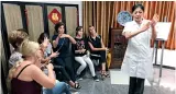  ??  ?? An expert from Beijing Tong Ren Tang explains traditiona­l Chinese medicine to locals in Montenegro.