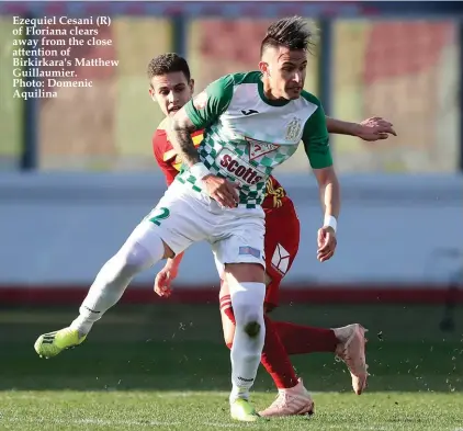  ?? Photo: Domenic Aquilina ?? Ezequiel Cesani (R) of Floriana clears away from the close attention of Birkirkara's Matthew Guillaumie­r.