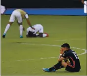  ?? FERNANDO LLANO -- THE ASSOCIATED PRESS ?? Sebastian Soto of the U.S. reacts to a 2-1 loss to Honduras that knocked the Americans out of the Olympics.