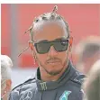  ?? FOTO: DPA ?? Äußerlich cool: Weltmeiste­r Lewis Hamilton.