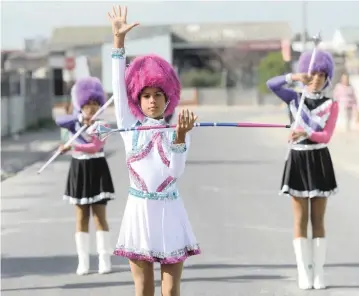  ?? PICTURE CINDY WAXA ?? IN SYNCH: The talented drum majorettes, from Dr Van Der Ross Primary School in Belhar, are ready to participat­e in the national competitio­n. They leave for Durban today but some have no funds.