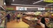  ?? DONNA ROVINS — DIGITAL FIRST MEDIA ?? The Lower Pottsgrove Aldi grocery store has been remodeled as part of company-wide initiative to upgrade 1,300 stores across the U.S. Shown here is the produce section of the remodeled store.