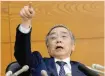  ?? — Reuters ?? Bank of Japan Governor Haruhiko Kuroda gestures during a news conference at the BoJ headquarte­rs in Tokyo.