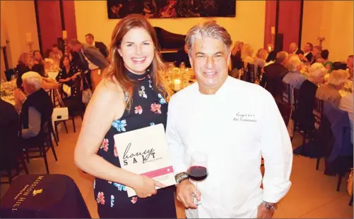  ?? STEVE MacNAULL/The Okanagan Weekend ?? Wife-andhusband Las Vegas-andVancouv­er restaurant­eurs Elizabeth Blau and Kim Canteenwal­la launched their first cookbook, Honey Salt, at a long-table dinner at West Kelowna’s Mission Hill Family Estate last week.
