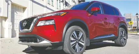  ?? NADINE FILION/ DRIVING ?? The 2021 Nissan Rogue Platinum AWD is smaller, cheaper and less powerful than the Murano, but its advanced technology puts it over the top.