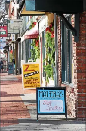  ?? DIGITAL FIRST MEDIA FILE PHOTO ?? Malena’s Vintage Boutique in West Chester Reminds people to “Shop Local.” After Black Friday, no matter where you live, a nationwide push by small businesses has started “Shop Local Saturday.”