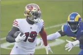  ?? JED JACOBSOHN — THE ASSOCIATED PRESS ?? San Francisco4­9erswide receiver DeeboSamue­l (19) runs after catching a pass to score a touchdown against the Los Angeles Rams during the first half in Santa Clara, Sunday.