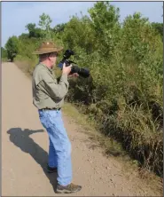  ?? NWA Democrat-Gazette/File Photo ?? David Oakley spotted a dragonfly last fall at Frog Bayou Wildlife Management Area. The state Game and Fish Commission recently bought 1,390 acres adjacent to the area.