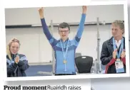  ??  ?? Proud moment Ruairidh raises his arms aloft as he’s announced as a Special Olympics gold medallist