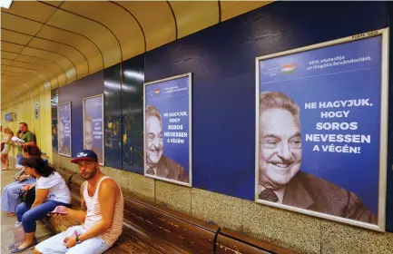  ?? (Laszlo Balogh/Reuters) ?? HUNGARIAN GOVERNMENT posters portray financier George Soros saying, ‘Don’t let George Soros have the last laugh,’ at an undergroun­d stop in Budapest last year.