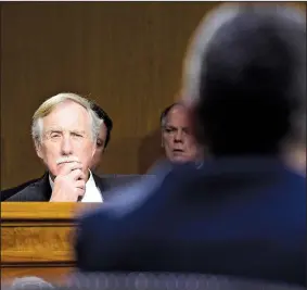  ?? AP/SUSAN WALSH ?? Sen. Angus King, I-Maine, listens to testimony Thursday in the Senate Intelligen­ce Committee from Clint Watts, a national security analyst and former FBI agent who noted that several Russians tied to the Kremlin inquiry have been killed in recent...