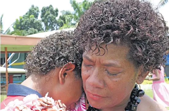  ?? Photo: Ronald ?? An emotional Ecelina Rokorairuk­u hugs her daughter, Asenaca Ranadi, 16, as she was named headgirl of Suva Special School on February 9, 2018.