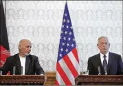  ?? RAHMAT GUL / ASSOCIATED PRESS ?? Afghan President Ashraf Ghani (left) speaks during a press conference with Secretary of Defense Jim Mattis at the presidenti­al palace in Kabul, Afghanista­n on Wednesday.