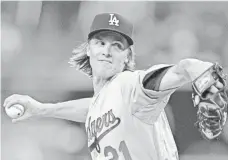  ?? JAKE ROTH, USA TODAY SPORTS ?? Dodgers right-hander Zack Greinke hasn’t given up a run since June 13, pitching 35 2⁄ scoreless innings.
3