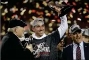  ?? ASSOCIATED PRESS ?? SAN FRANCISCO 49ERS HEAD COACH Kyle Shanahan and general manager John Lynch celebrate during an interview with Terry Bradshaw after the NFC Championsh­ip game against the Green Bay Packers on Sunday in Santa Clara, Calif.